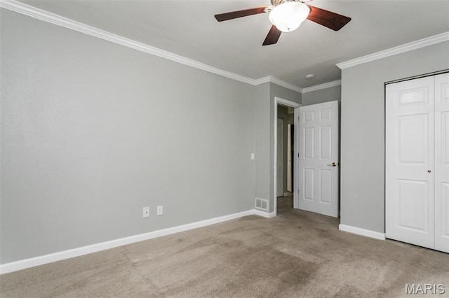28 Countryside Ln, Fairview Heights, IL 62208 - unfurnished bedroom featuring carpet flooring, baseboards, ornamental molding, a ceiling fan, and a closet
