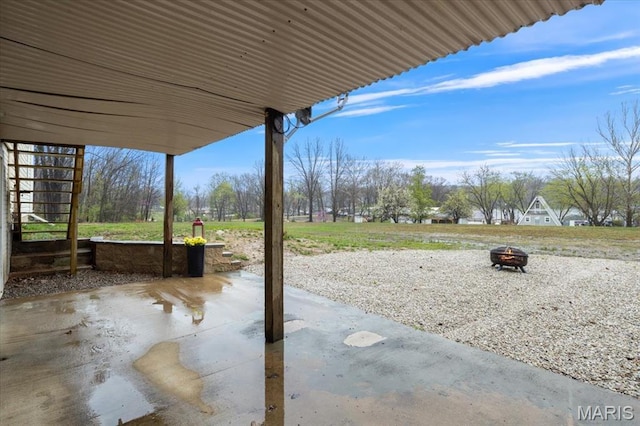 34441 Hickory Hills Rd, Mo, MO 65078 - view of patio / terrace with a fire pit