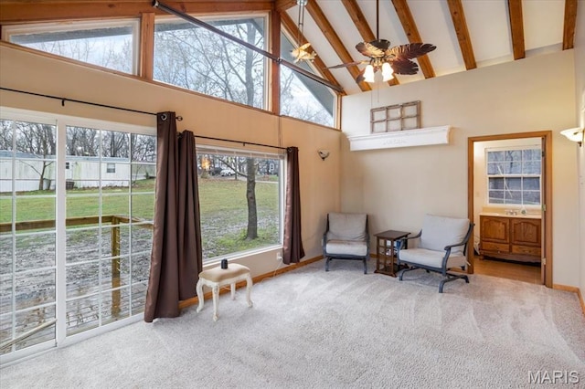 34441 Hickory Hills Rd, Mo, MO 65078 - sitting room with high vaulted ceiling, carpet, plenty of natural light, baseboards, and beam ceiling