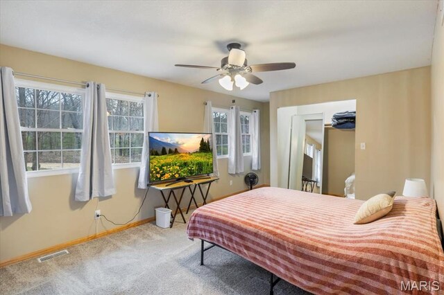 34441 Hickory Hills Rd, Mo, MO 65078 - carpeted bedroom featuring baseboards and a ceiling fan