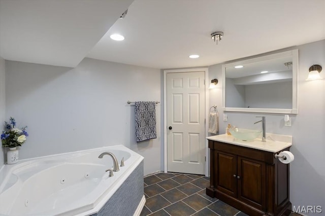 34441 Hickory Hills Rd, Mo, MO 65078 - bathroom featuring a whirlpool tub, vanity, and recessed lighting