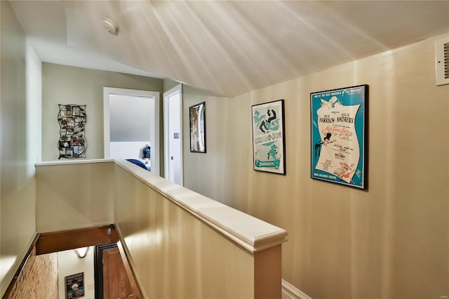 910 Lami St, Saint Louis, MO 63104 - corridor featuring an upstairs landing and baseboards