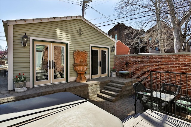 910 Lami St, Saint Louis, MO 63104 - back of house with french doors and a patio