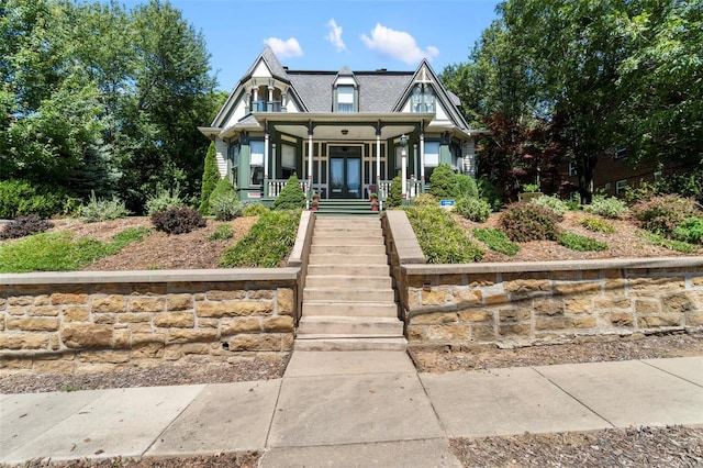 312 Bellevue St, Cape Girardeau, MO 63701 - victorian-style house featuring covered porch