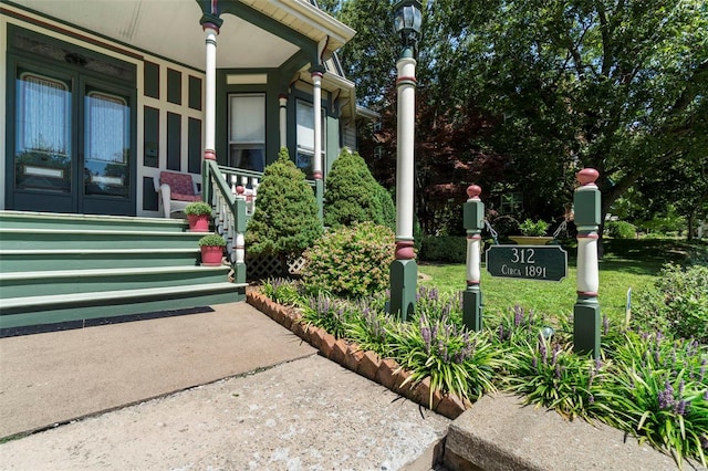 312 Bellevue St, Cape Girardeau, MO 63701 - property entrance featuring a porch and french doors