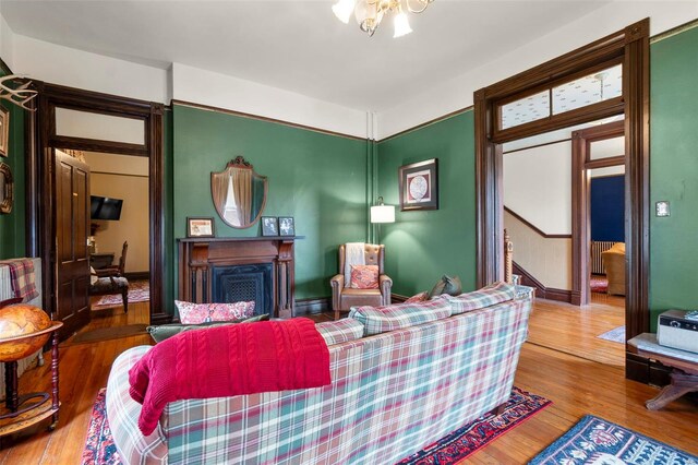 312 Bellevue St, Cape Girardeau, MO 63701 - living room featuring a fireplace and wood finished floors
