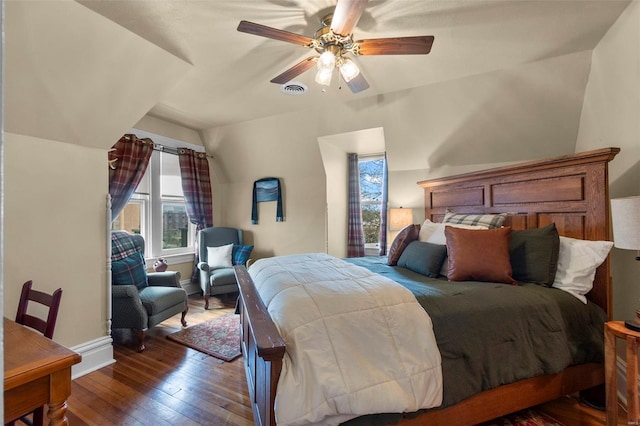312 Bellevue St, Cape Girardeau, MO 63701 - bedroom featuring multiple windows, hardwood / wood-style flooring, baseboards, ceiling fan, and vaulted ceiling