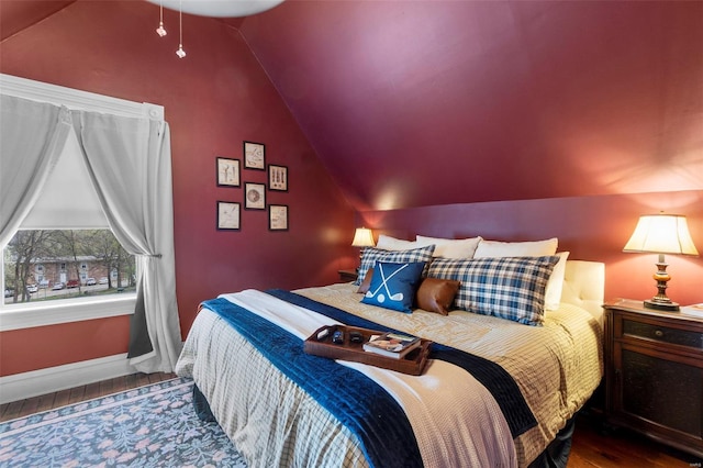 312 Bellevue St, Cape Girardeau, MO 63701 - bedroom featuring vaulted ceiling, wood finished floors, and baseboards