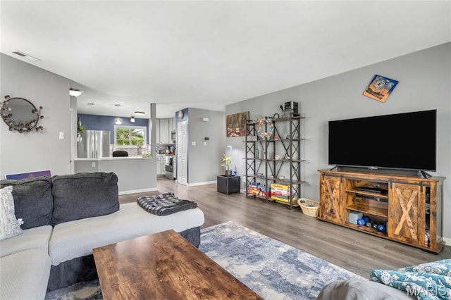 745 Sugar Glen Dr Unit 5, Saint Peters, MO 63376 - living room with light wood-style floors and baseboards