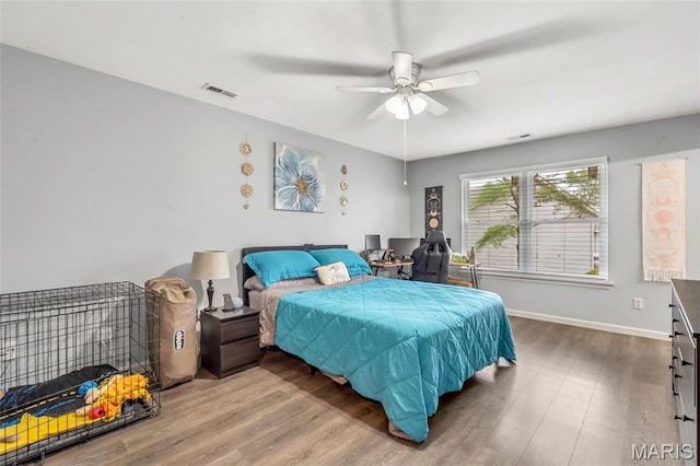 745 Sugar Glen Dr Unit 5, Saint Peters, MO 63376 - bedroom featuring wood finished floors, baseboards, and ceiling fan