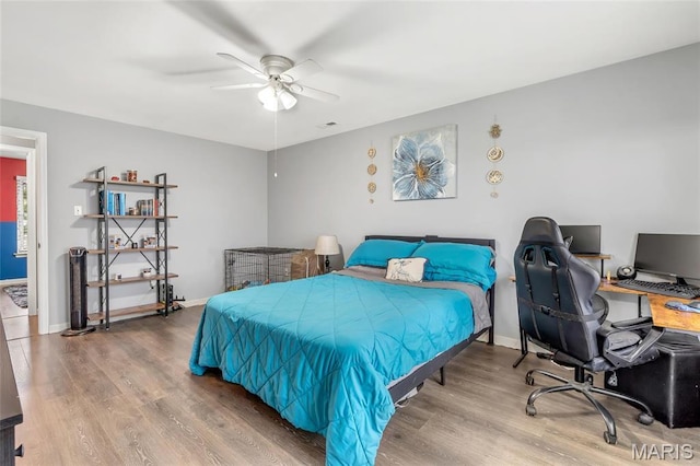 745 Sugar Glen Dr Unit 5, Saint Peters, MO 63376 - bedroom with wood finished floors, a desk, and baseboards