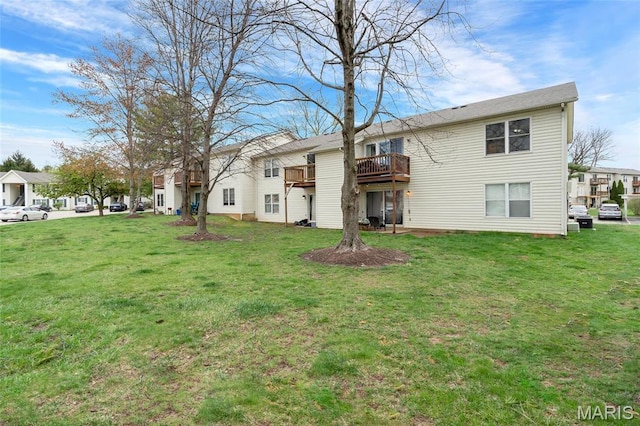745 Sugar Glen Dr Unit 5, Saint Peters, MO 63376 - back of house with a yard and a wooden deck