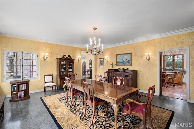 8 Carrswold Dr, Clayton, MO 63105 - dining room with crown molding, arched walkways, a chandelier, and baseboards