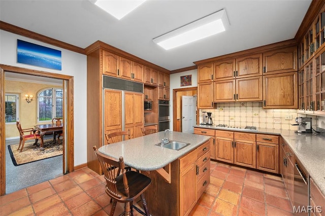 8 Carrswold Dr, Clayton, MO 63105 - kitchen featuring a sink, stainless steel appliances, backsplash, brown cabinets, and crown molding
