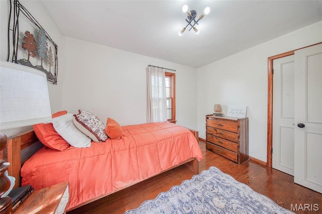 1003 S Warfel St, Salem, MO 65560 - bedroom with wood finished floors and baseboards