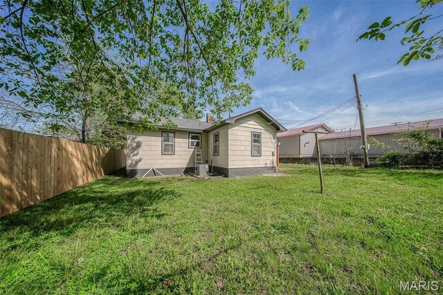 1003 S Warfel St, Salem, MO 65560 - rear view of house with central AC unit