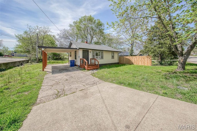 1003 S Warfel St, Salem, MO 65560 - view of front of home with concrete driveway and an attached carport