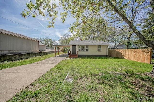 1003 S Warfel St, Salem, MO 65560 - view of front of house with concrete driveway, a carport, and entry steps