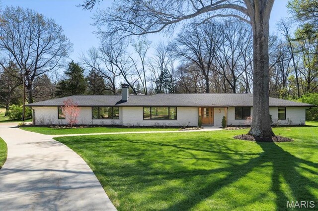 12 Westfield, Frontenac, MO 63131 - mid-century modern home with a front lawn and a chimney