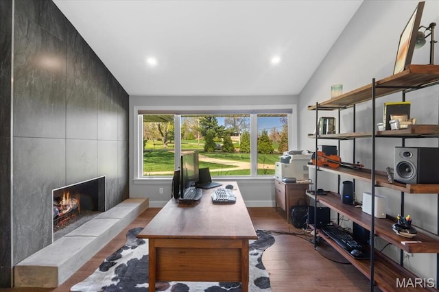 12 Westfield, Frontenac, MO 63131 - office space featuring lofted ceiling, plenty of natural light, wood finished floors, a fireplace, and recessed lighting