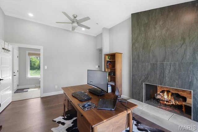 12 Westfield, Frontenac, MO 63131 - office with wood finished floors, ceiling fan, baseboards, a premium fireplace, and recessed lighting