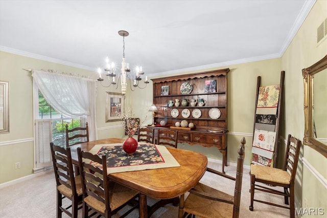 14590 Ansonborough Ct, Chesterfield, MO 63017 - dining space featuring a chandelier, light colored carpet, crown molding, and baseboards