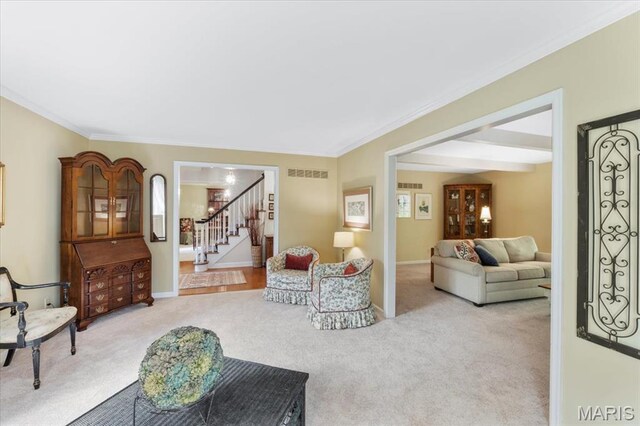 14590 Ansonborough Ct, Chesterfield, MO 63017 - carpeted living room with stairs, crown molding, and baseboards