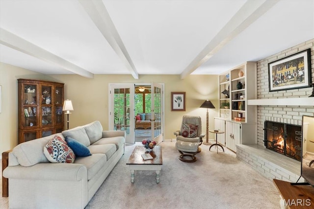 14590 Ansonborough Ct, Chesterfield, MO 63017 - living area featuring beam ceiling, carpet flooring, a fireplace, and baseboards