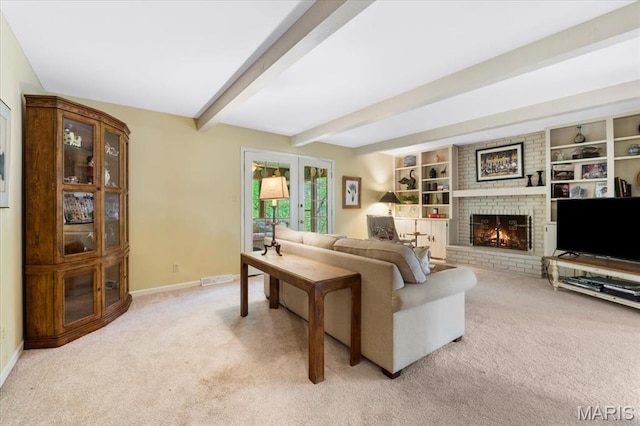 14590 Ansonborough Ct, Chesterfield, MO 63017 - living room with light colored carpet, a brick fireplace, beam ceiling, and baseboards