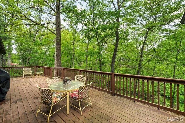 14590 Ansonborough Ct, Chesterfield, MO 63017 - wooden deck with outdoor dining space