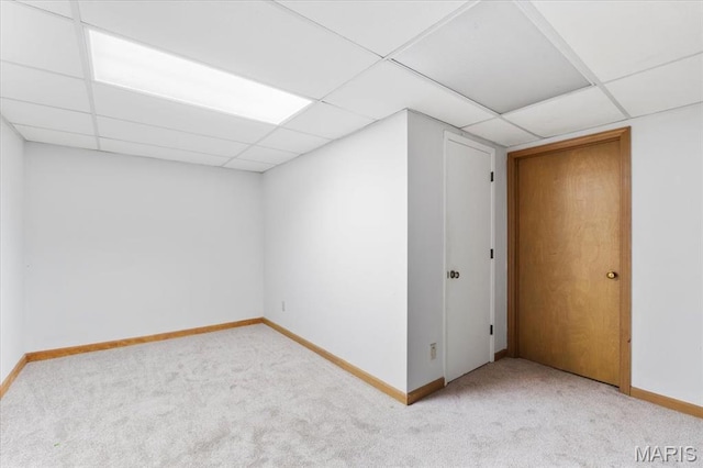 14590 Ansonborough Ct, Chesterfield, MO 63017 - basement featuring a drop ceiling, carpet, and baseboards
