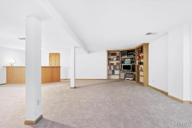 14590 Ansonborough Ct, Chesterfield, MO 63017 - finished basement featuring carpet flooring, baseboards, and built in shelves