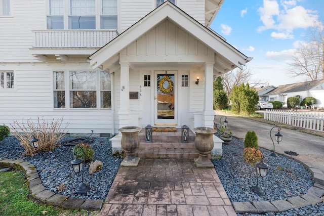 doorway to property featuring board and batten siding