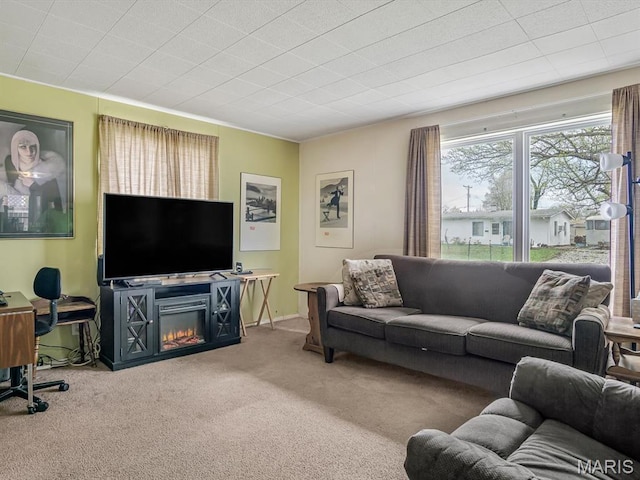 1120 Saint Michael Dr E, St Louis, IL 62206 - carpeted living room with a glass covered fireplace