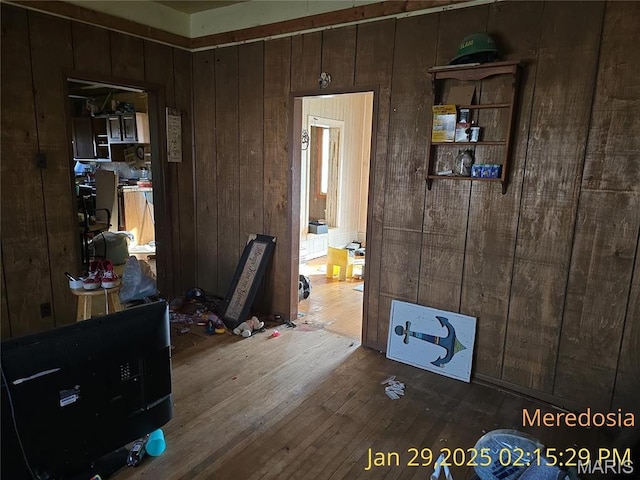514 NW Washington St, Meredosia, IL 62665 - bedroom featuring wooden walls and wood finished floors