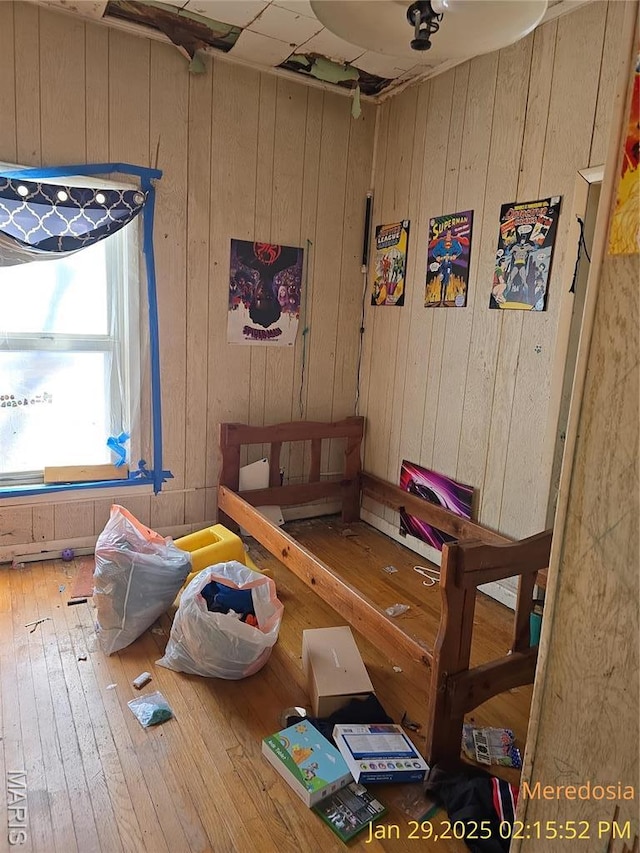 514 NW Washington St, Meredosia, IL 62665 - interior space featuring hardwood / wood-style flooring and wooden walls