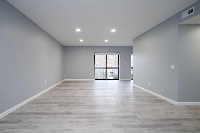 572 Coeur De Royale Dr Unit 108, Saint Louis, MO 63141 - unfurnished room featuring recessed lighting, light wood-style flooring, and baseboards