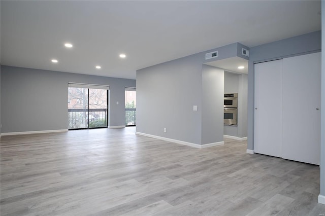 572 Coeur De Royale Dr Unit 108, Saint Louis, MO 63141 - unfurnished room featuring recessed lighting, light wood-style flooring, and baseboards