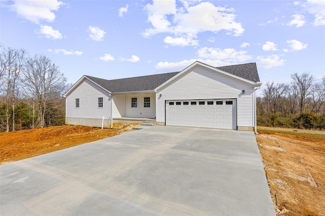 308 Blackberry Ln, Bismarck, MO 63624 - single story home with a garage, concrete driveway, and roof with shingles