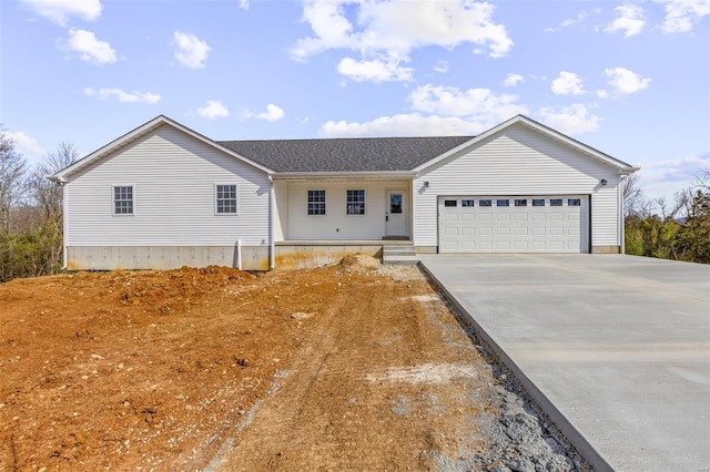 308 Blackberry Ln, Bismarck, MO 63624 - ranch-style home with a garage, driveway, a shingled roof, and covered porch
