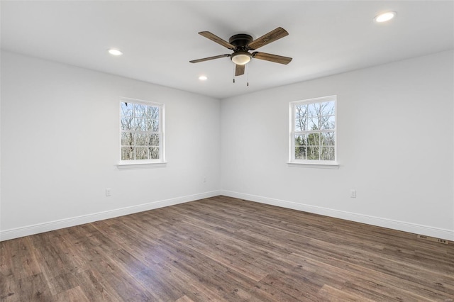 308 Blackberry Ln, Bismarck, MO 63624 - empty room with plenty of natural light, wood finished floors, ceiling fan, and recessed lighting