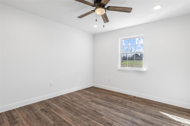 308 Blackberry Ln, Bismarck, MO 63624 - empty room with dark wood finished floors, baseboards, recessed lighting, and ceiling fan