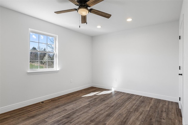 308 Blackberry Ln, Bismarck, MO 63624 - empty room with dark wood-type flooring, baseboards, recessed lighting, and a ceiling fan