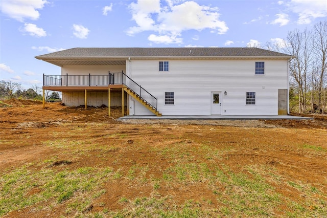 308 Blackberry Ln, Bismarck, MO 63624 - rear view of property featuring a wooden deck, stairway, a patio area, and roof with shingles