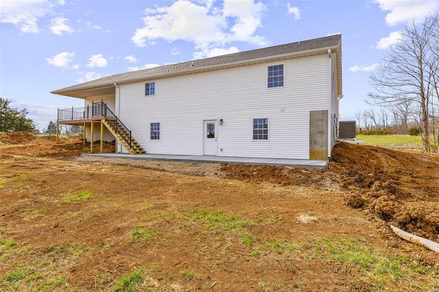308 Blackberry Ln, Bismarck, MO 63624 - rear view of house featuring stairway, a wooden deck, and cooling unit