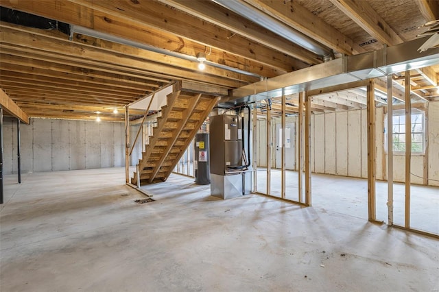 308 Blackberry Ln, Bismarck, MO 63624 - basement featuring water heater, stairway, and heating unit