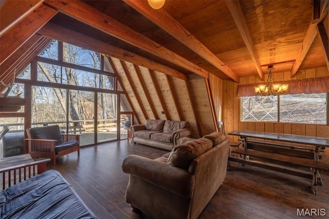 756 E St Gallen Dr, Innsbrook, MO 63390 - living room with wooden walls, a chandelier, dark wood finished floors, wooden ceiling, and plenty of natural light