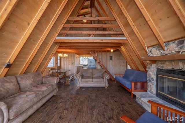 756 E St Gallen Dr, Innsbrook, MO 63390 - living area featuring a chandelier, a fireplace, wood finished floors, wood ceiling, and wooden walls