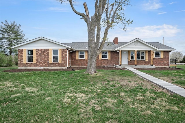 4 Tiger Dr, Wentzville, MO 63385 - ranch-style house featuring brick siding, a front yard, a porch, and a chimney