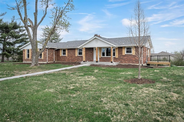 4 Tiger Dr, Wentzville, MO 63385 - ranch-style house with brick siding, a front yard, and covered porch